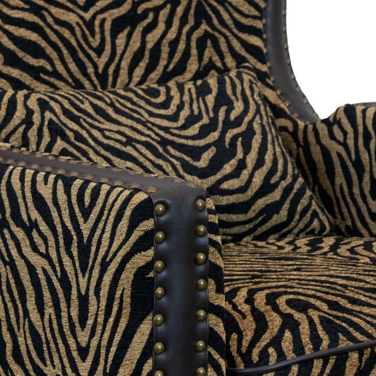 Instinct Wingback Armchair with Brass Studs