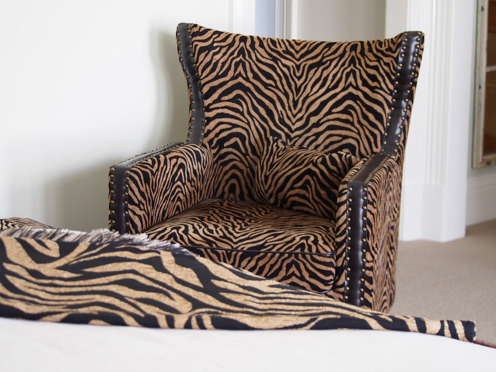 Instinct Wingback Armchair with Brass Studs
